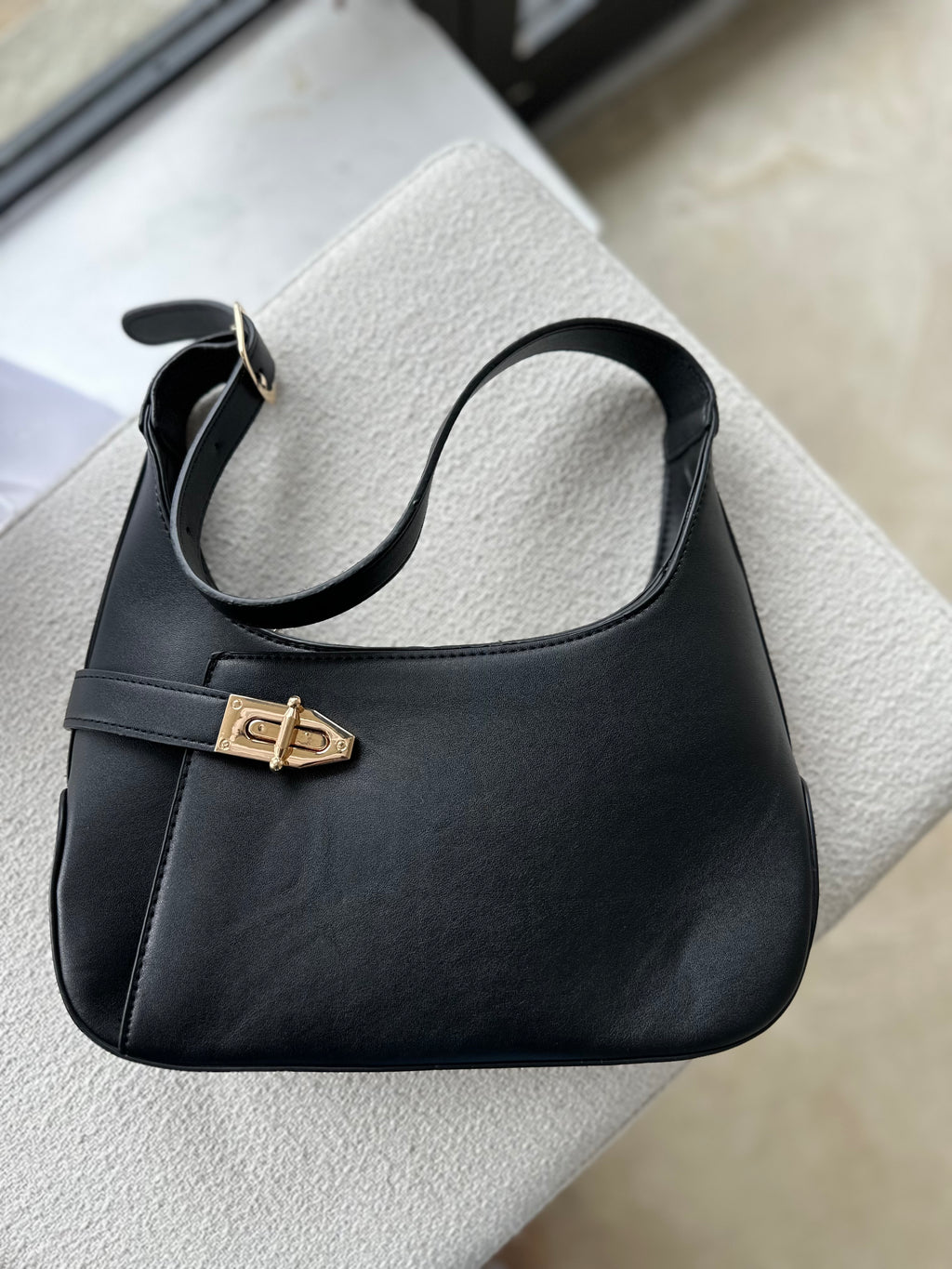 The Luxe Lock Shoulder Bag